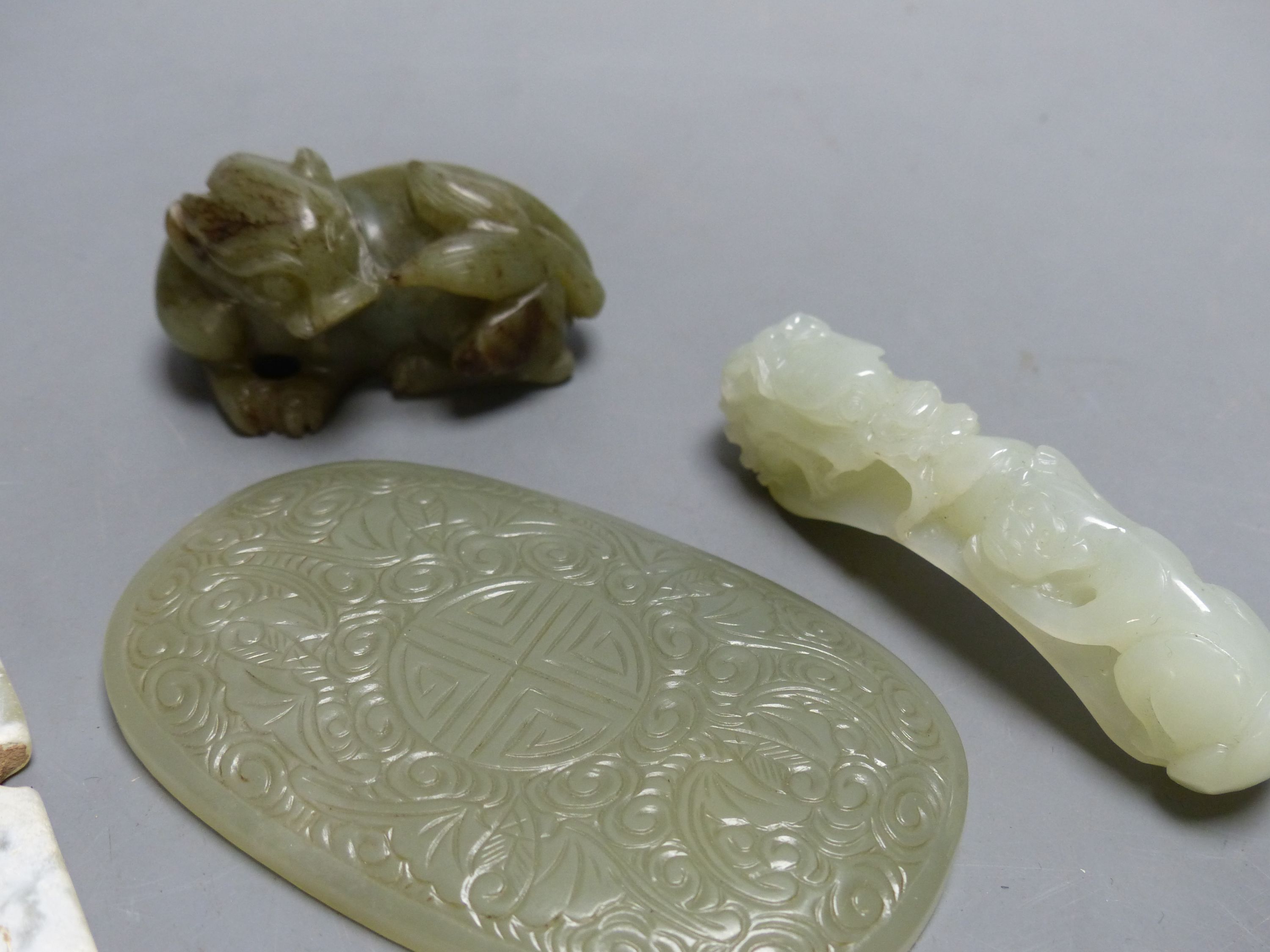 Six Chinese jade or hardstone carvings, longest 13.5cm